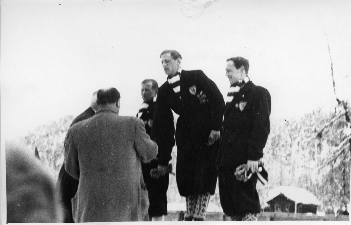 Medal ceremony in Winter Olympics in St. Moritz 1948: Gold to Petter Hugsted, silver to Birger Ruud, bronze to Torleif Schjelderup.