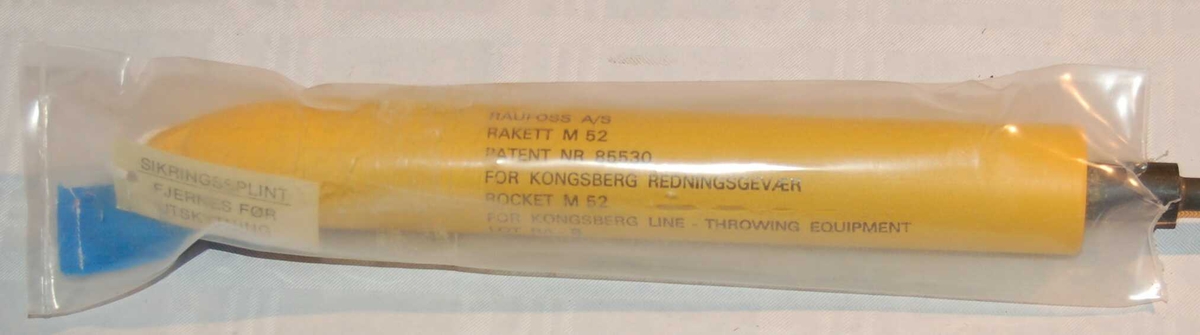Pilstamme av jern med påmontert rakett tilpasset eit Kongsberg Redningsgevær M.52.