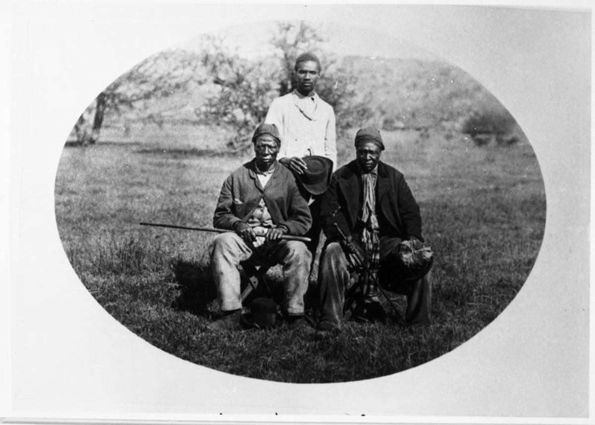 Namibia.  Left Chief Maherero Zjanvaha nuddle, Wilhelm Mahareyo son of Chief Maharero  right, Chief Councillor Riania