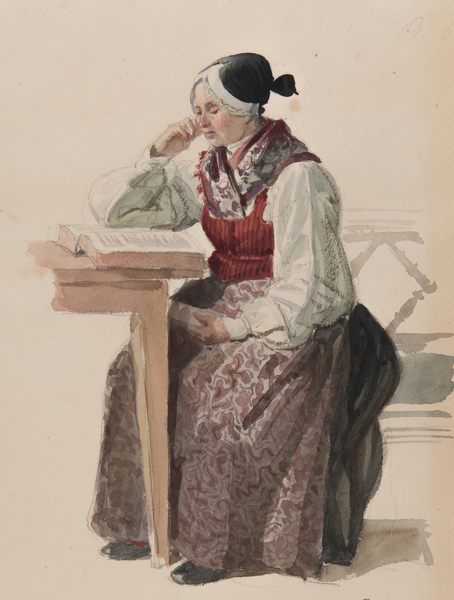 Kvinna i kyrkdräkt, Ljusdahl 1840. Akvarell av J.W Wallander. Kvinna i helfigur, sittande vid ett bord med en bok .