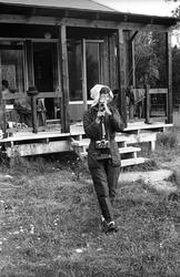 Landskap med person(er).