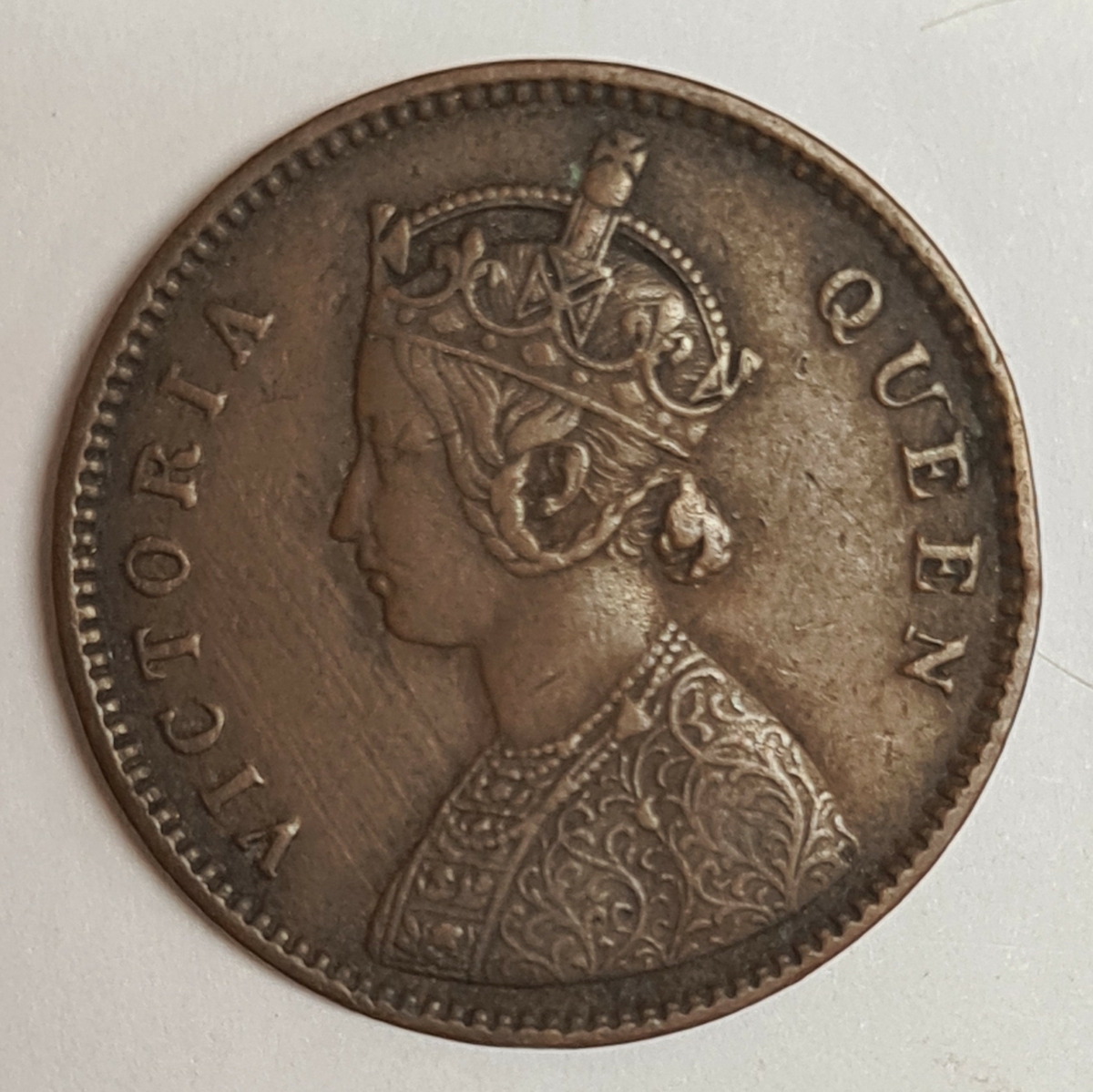 Två mynt från Indien/Storbritanien.
1/4 Anna, 1862
1/4 Anna, 1862
