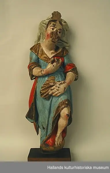 Helgonbild, skulptur, av trä med blå och röd mantel med guldkanter.