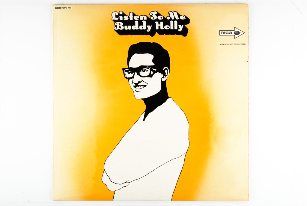 Bilde av artisten, Buddy Holly, på forsiden av coveret.