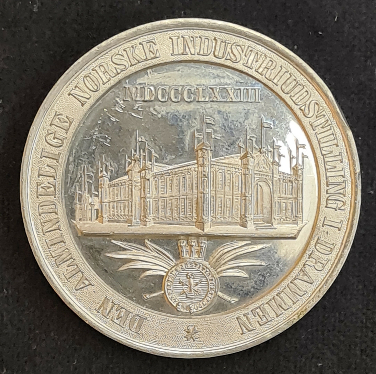 Medalj från Industriutställningen i Drammen, Tyskland år 1873.