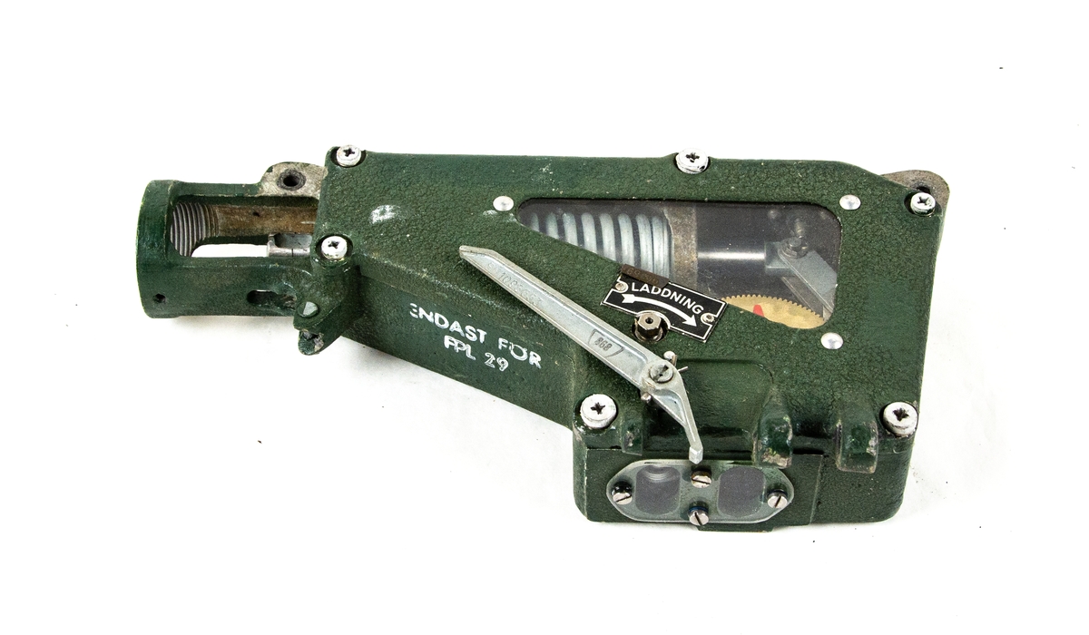 Tidutlösare tillverkad av SAAB S1047257-1 i grönlackerad metall och med en inre fjäder-mekanism.
Påklistard tejp med påskrift 75-02-22-20.