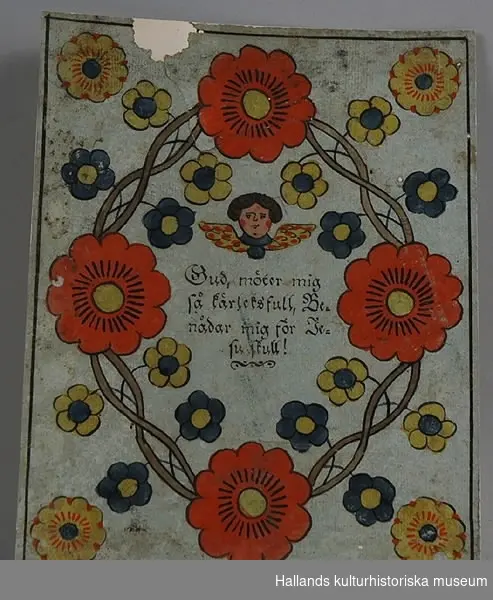 Kistebrev, föreställande blomsterkrans i rött, blått och gult. I mitten kerub, därunder text: "Gud möter mig så kärleksfull, Benådar mig för Jesu skull."