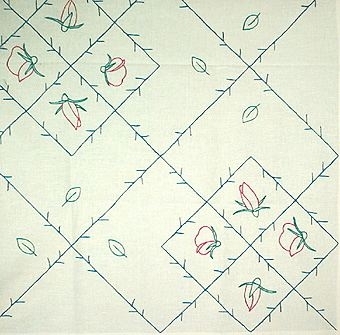 Duk med stjälksömsbroderi av blått, rött och grönt Klippans lingarn 16/2.