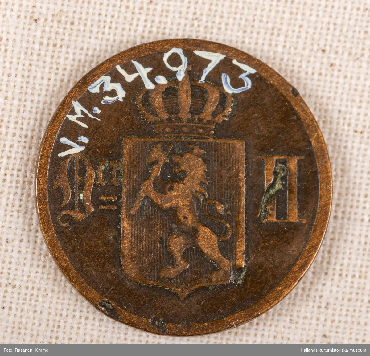 Mynt av koppar. 2 ØRE (öre).1877Oscar II:s namnchiffer (teckning)