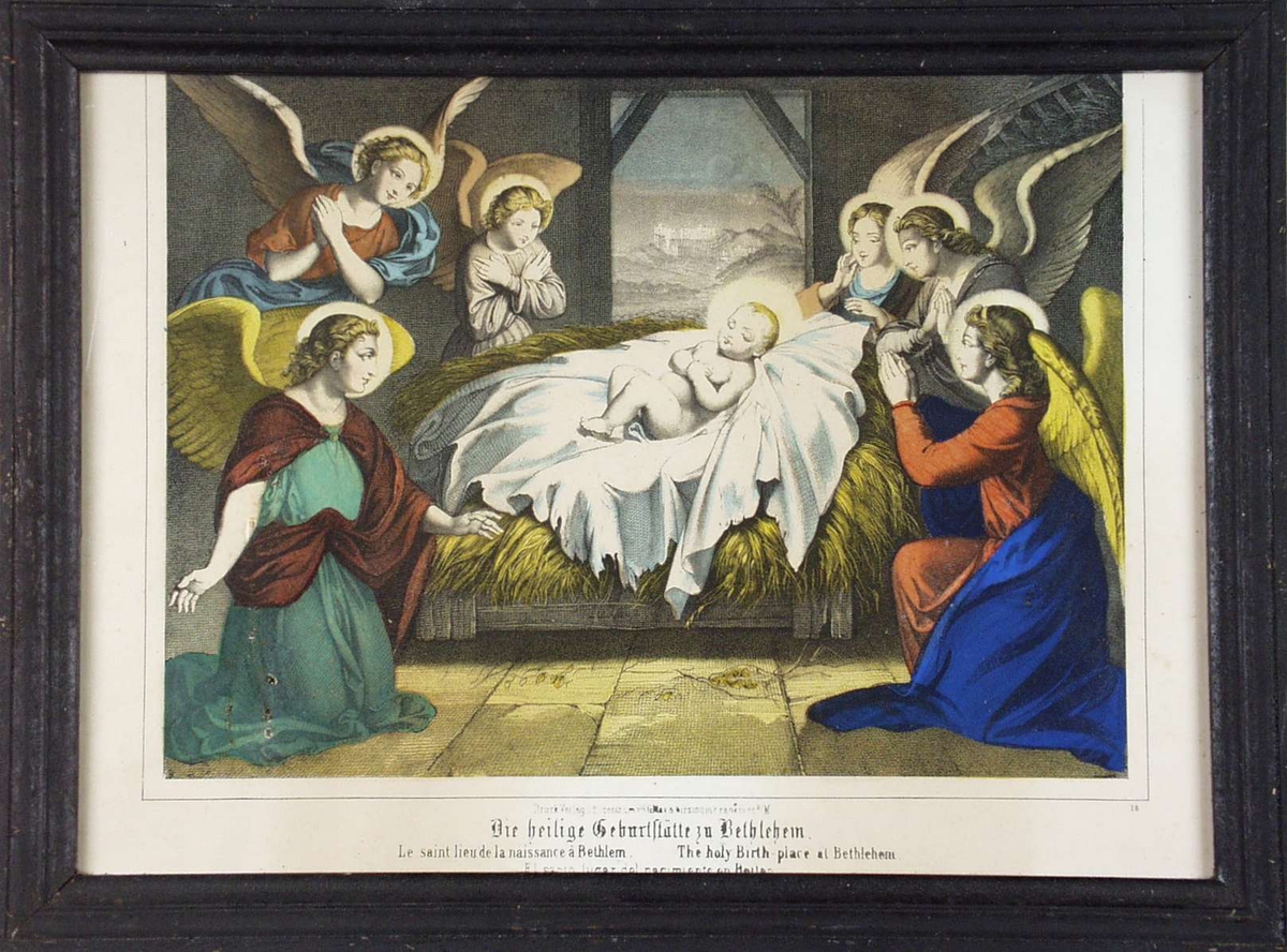 Nyfødte Jesus i stallen omgitt av engler.
