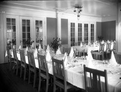 Kort:  Dovre, 13/1-1916. Interiør i Dombaas Hotel, spisesale