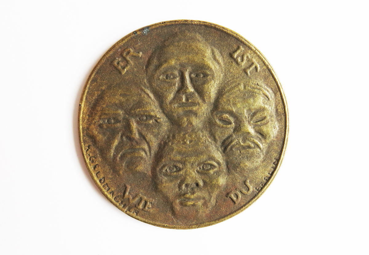 Motiv advers: Fire ansikter, fra venstre: indianer, europeer, asiat og afrikaner.

Motiv revers: Tekst.