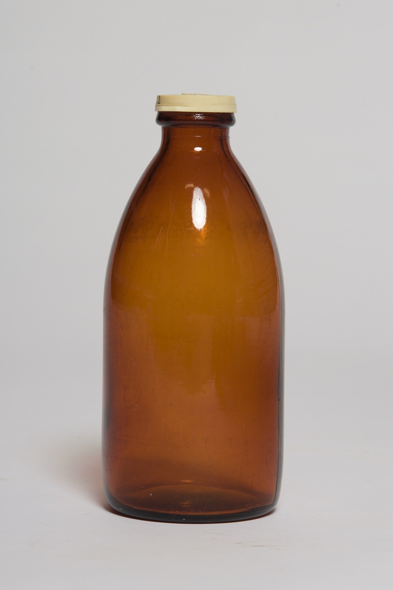 Brun glassflaske.