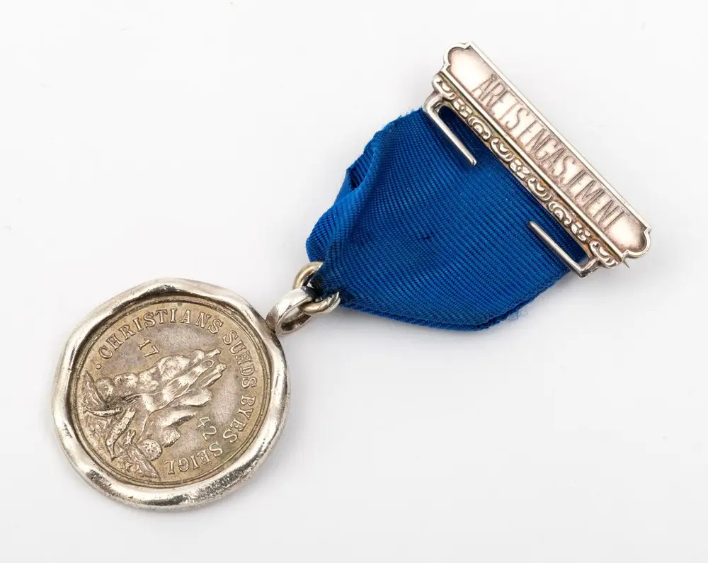 Registreringsbilde av medalje for "Årets engasjement 2019".