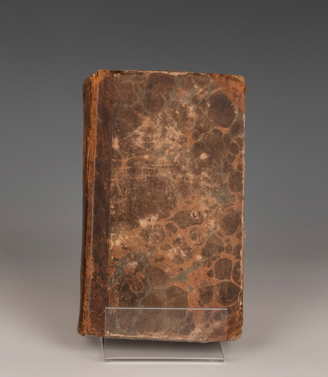 marmorert omslag, 243 skrevet på baksiden, innbundet, årstall 1793