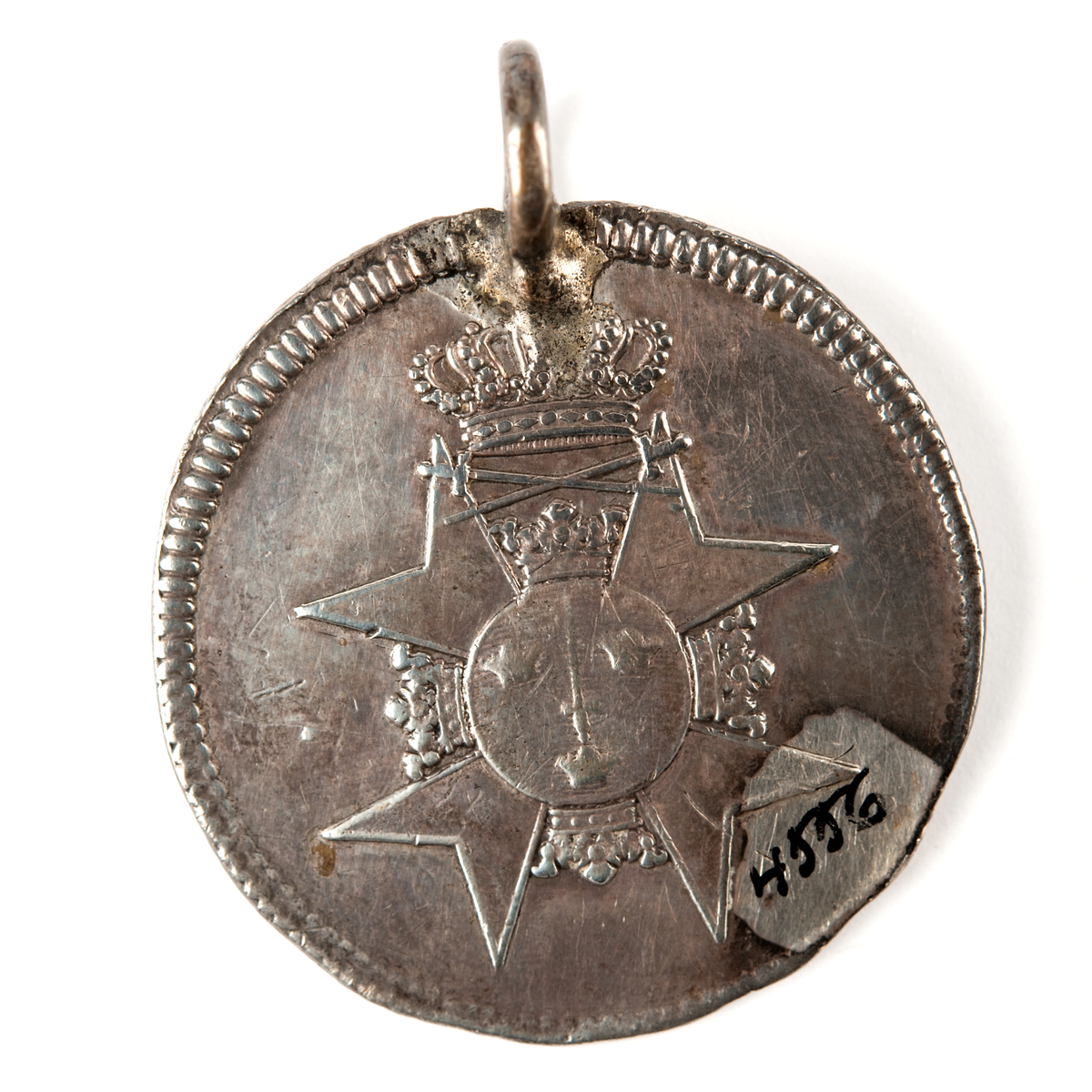 Medalj, silver, lika med N:o 4.555.