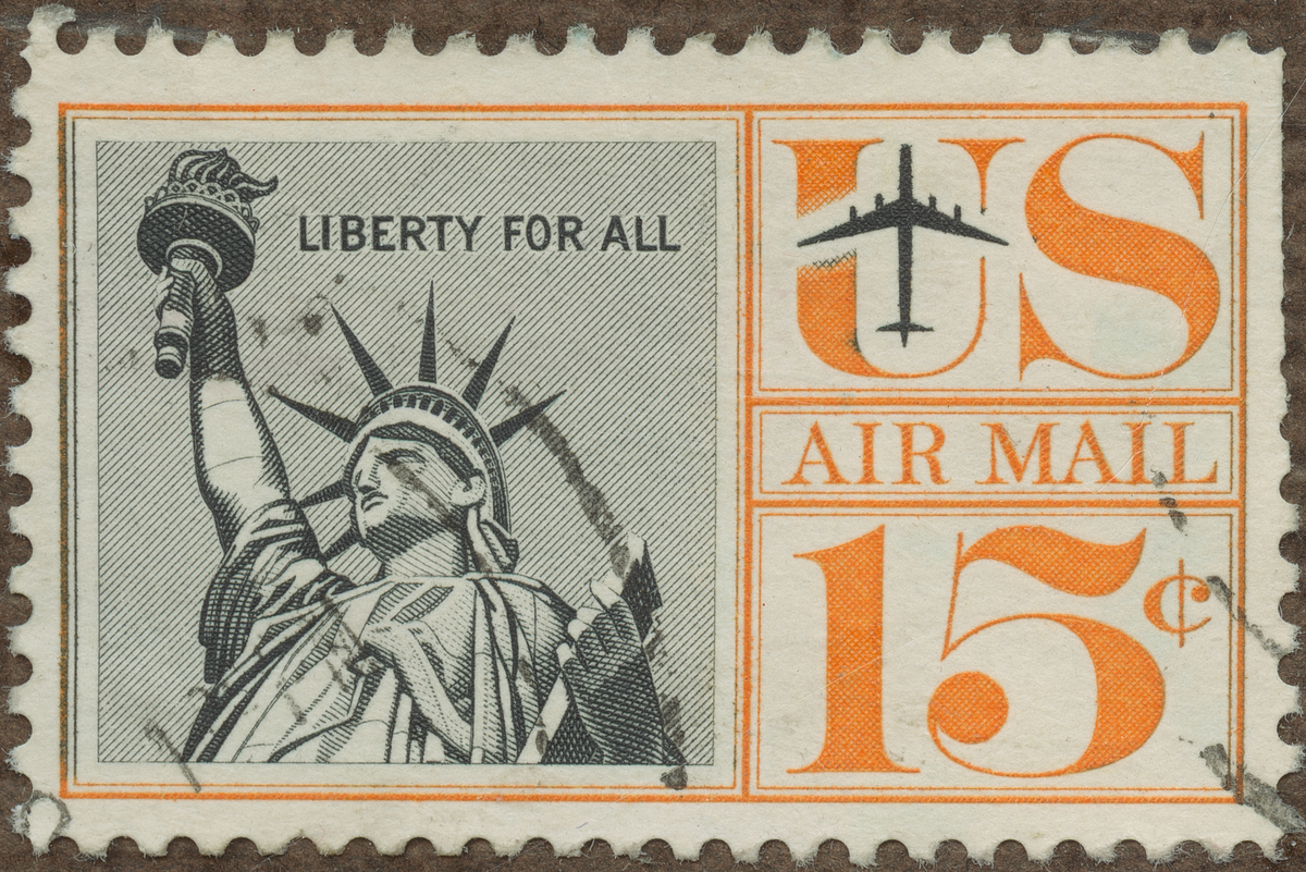Frimärke ur Gösta Bodmans filatelistiska motivsamling, påbörjad 1950.
Frimärke från U.S.A., 1959. Motiv av Frihets Statyen i New Yorks Hamn -"Liberty for All"- -Fyr- Gåva från Frankrike till USA: 1886 Flygpostmärke