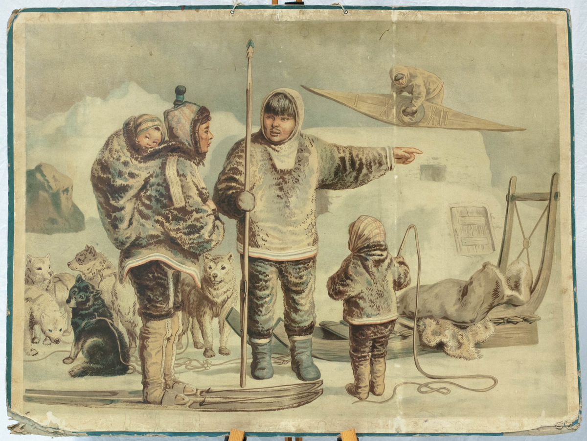 En inuittfamilie foran en hundeslede
