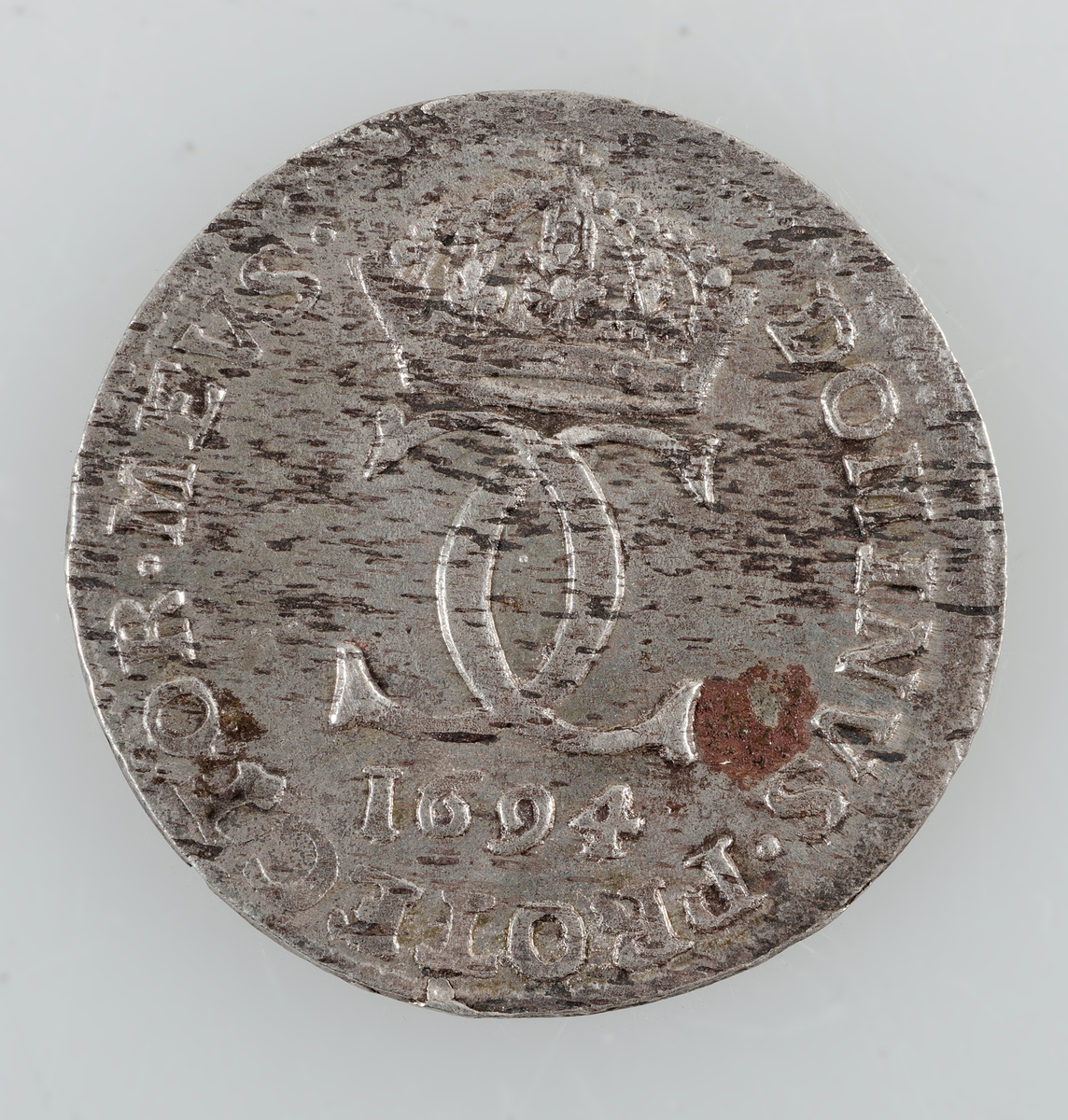Mynt. 5 öre 1694 (Karl XI). Präglat i Stockholm.
