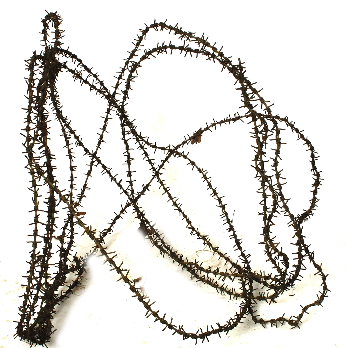 Piggtråd,   Jerntråd, en kveil, med gulmaling på,  endel rusten