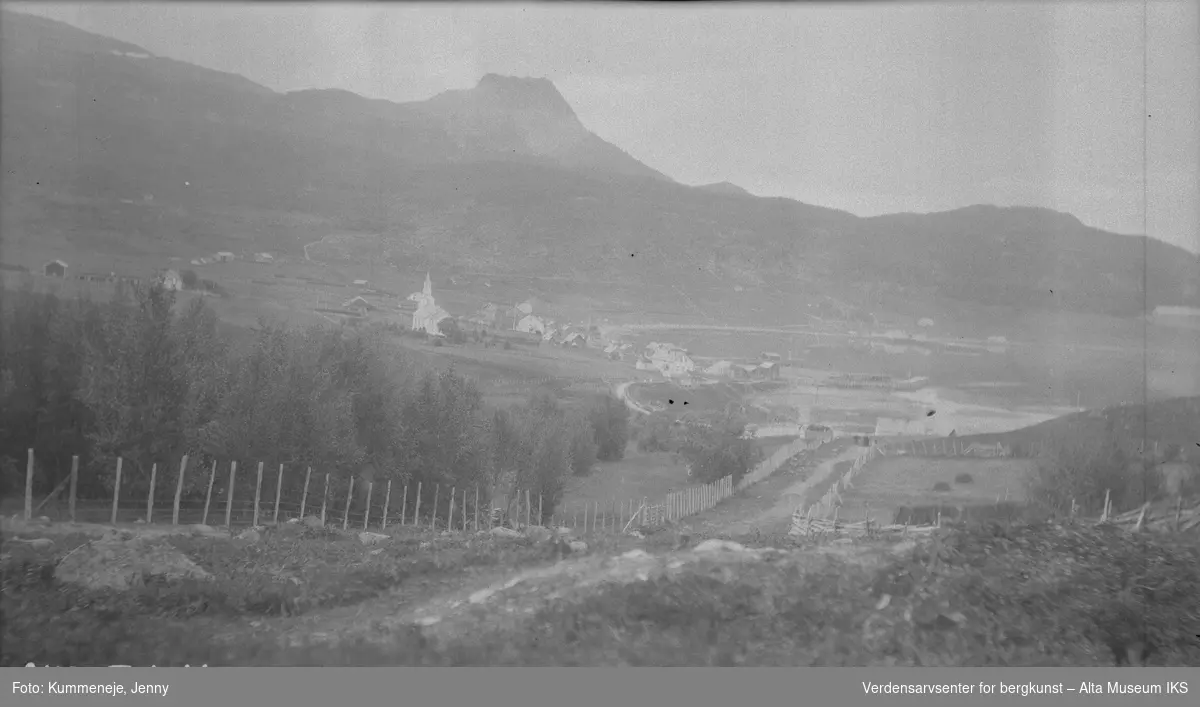 Landskapsbilde av Talvik. Kirke i bakgrunn, 1921