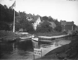 Tre personer i båt - Eidkilkanalen 22/7-1926. Kragerø