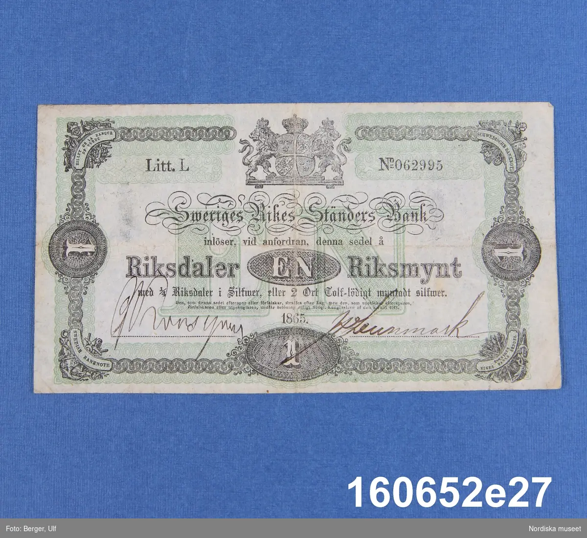 Sveriges Rikes Ständers Bank, 1 riksdaler riksmynt. Daterad 1865, litt L nr 062995.