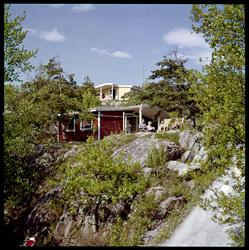 Hydrostranda, familie foran hytte.