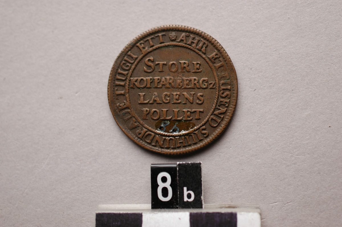 Mynt med inskrift: "Begge ett Aendamahl". Stora Kopparbergs enskilda kopparmynt eller s.k. myntpolletter.