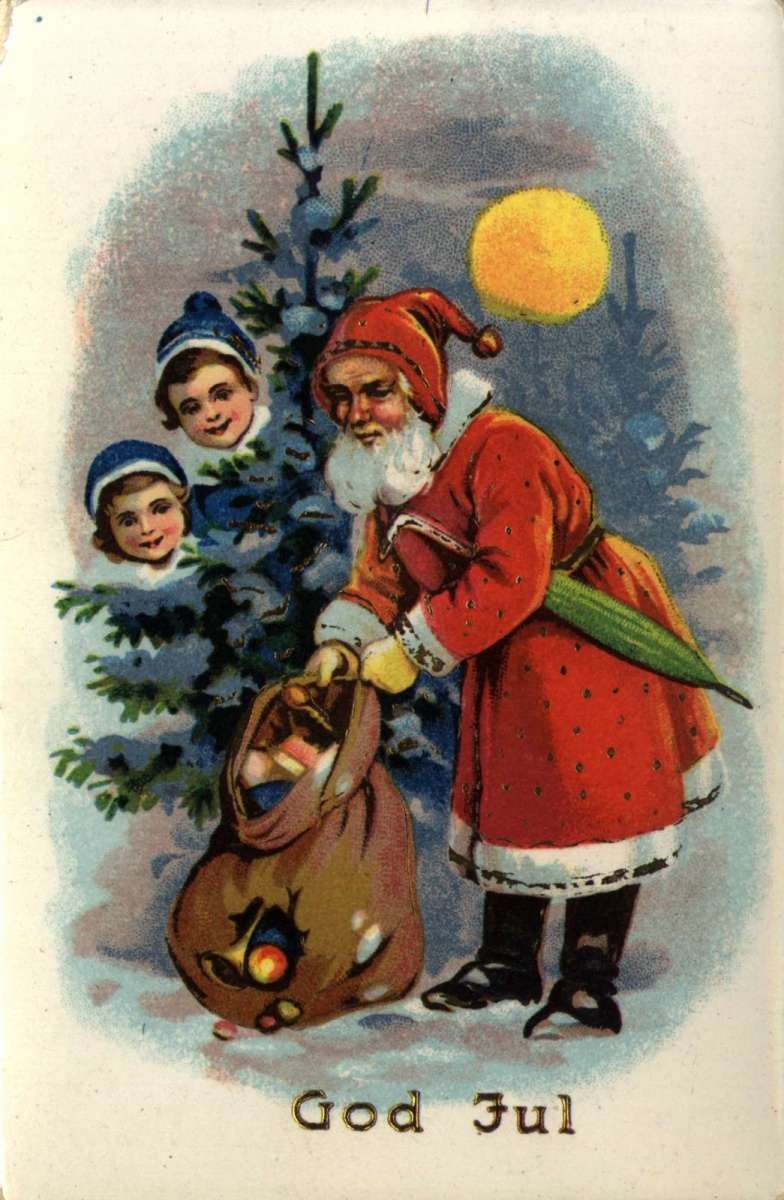 Julekort. Jule- og nyttårshilsen. Julenisse med gavesekk foran juletreet. To barnehoder titter fram bak juletreet. Stemplet 16.12.1930.