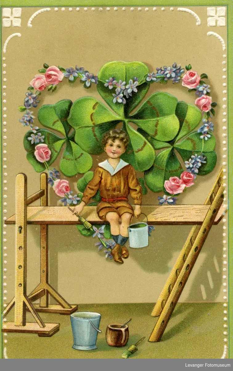 Postkort  gutt et et blomsterhjerte, brukt som julekort.