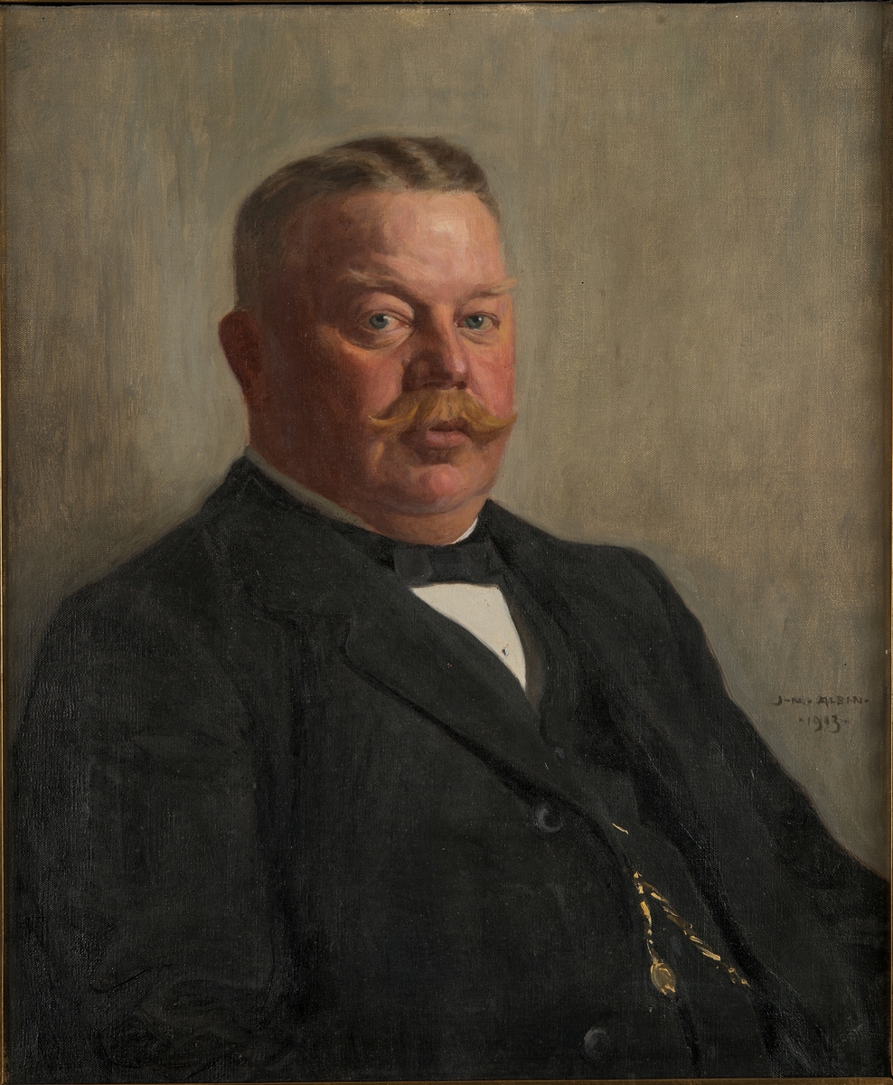 Porträtt av ångbåtskaptenen Arvid Carlsson.