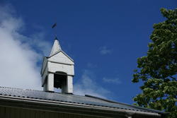 Mølstad, Nes, Ringsaker. På Mølstad vestre er klokketårnet p