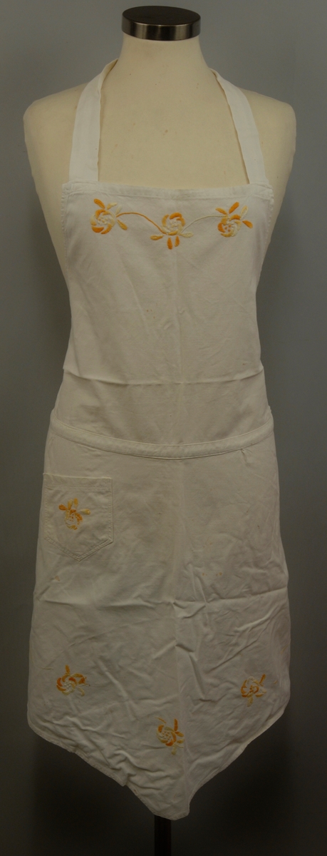 Blomstermotiv. Ranke øverst ved øvre smekke. Ranke på lomme, samt nedre del.