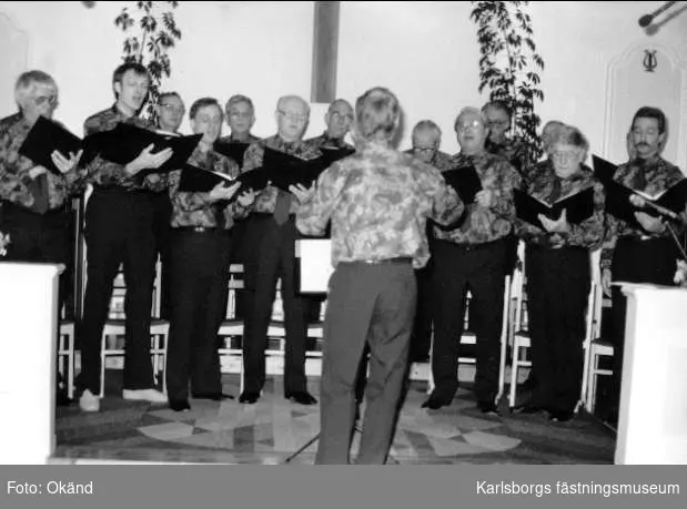 Karlsborg manskörs 90-års jubileum, 13/4 1991. Här konsert i missionskyrkan. Namnlista finns på bilaga till 55873.