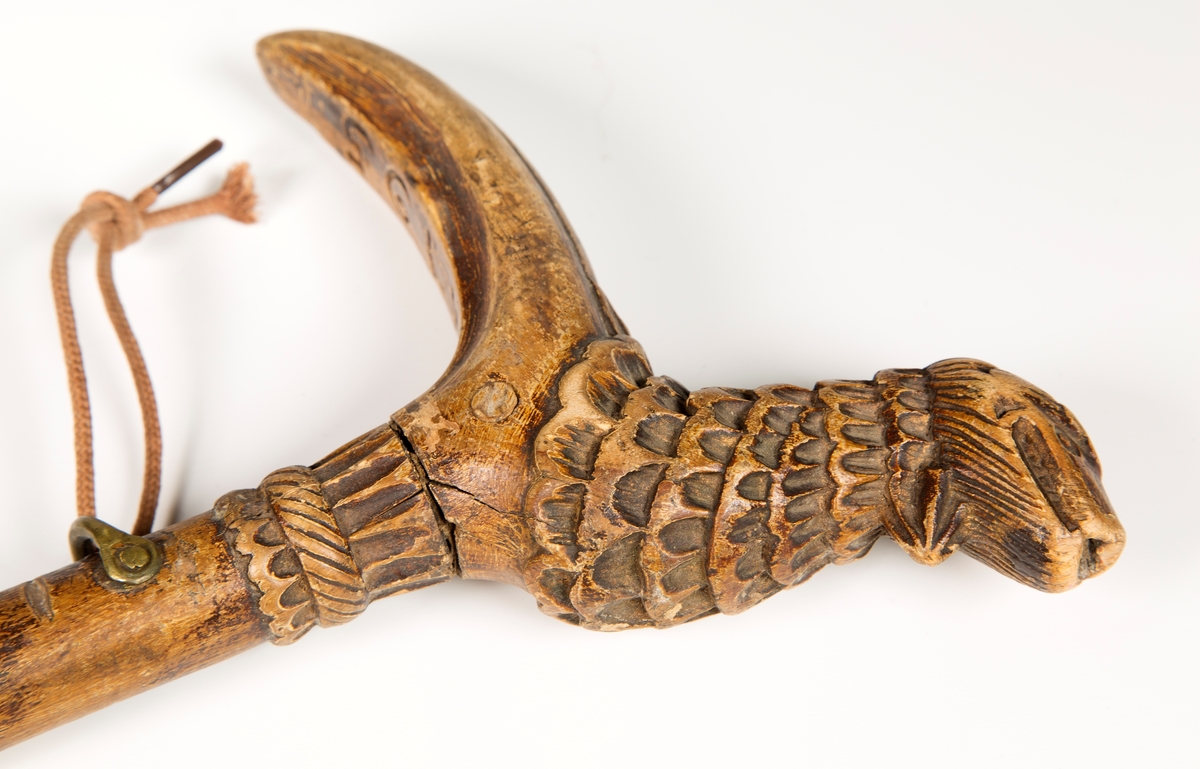 Håndtak skåret som fugl