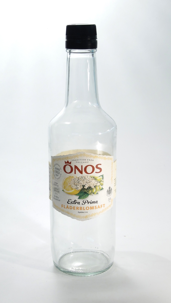 Flaska tillverkad på Limmareds glasbruk åt företaget Önos.
Cylindrisk med avsmalnande halv. Gängad svart plastkork. 
Etikett på visningssida innehållande bl.a. följande information: "ÖNOS // Extra prima FLÄDERBLOMSAFT"