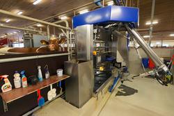 Mjølkerobot. Robot for mjølking av kyr. Storfe. Melking. Mel