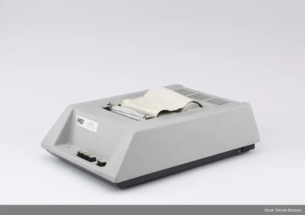 Videoprinter med papirrull i maskinen.