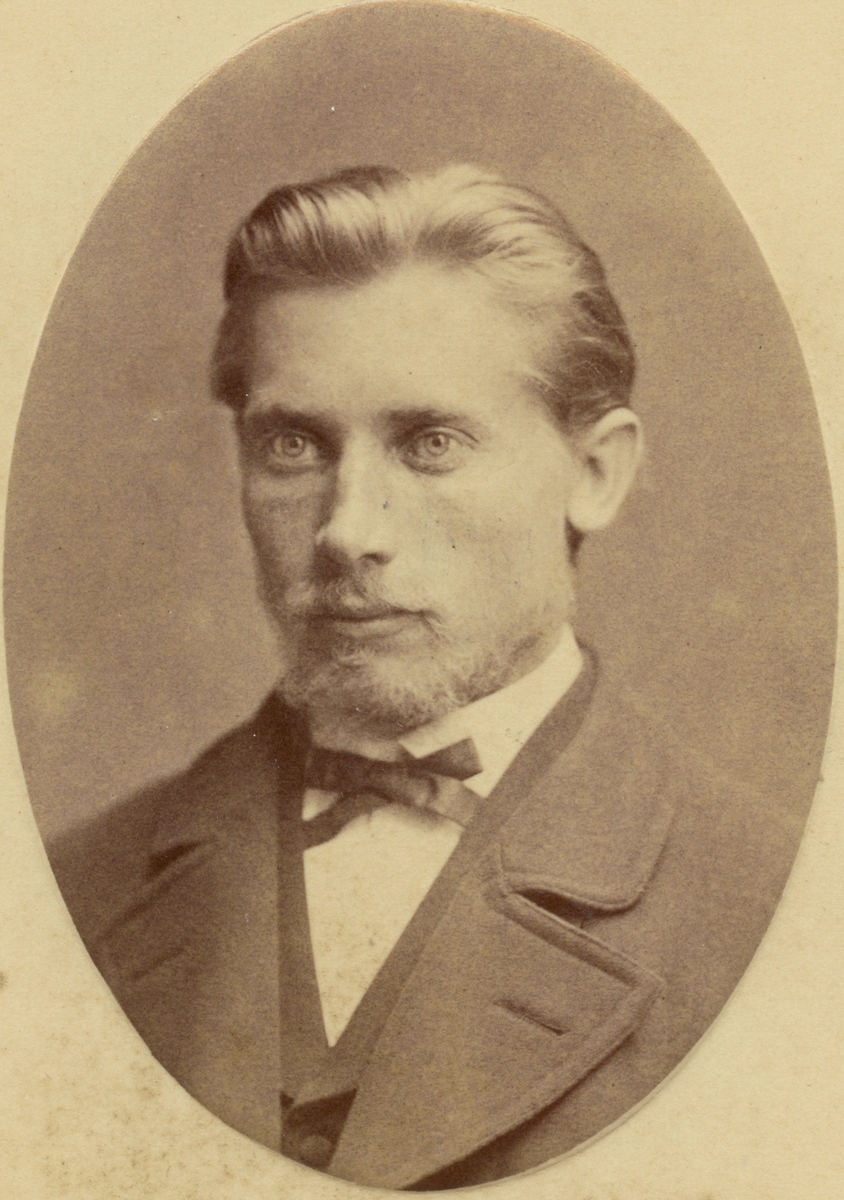 Porträtt av Oskar Falk i början av 1870-talet.