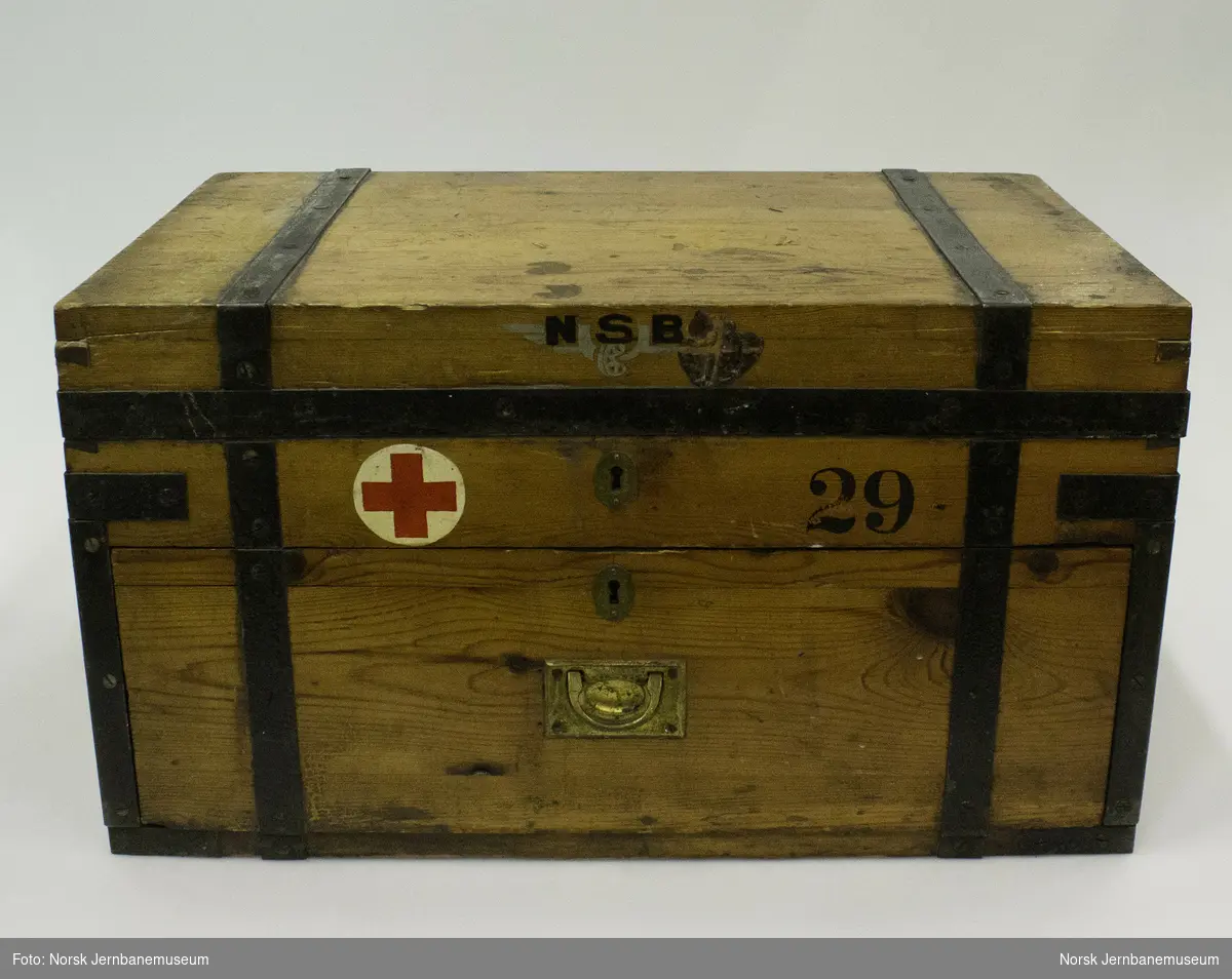 First aid box from the National state railsways (NSB) company health service. Contents include medicines, bandages and various first aid equipment.