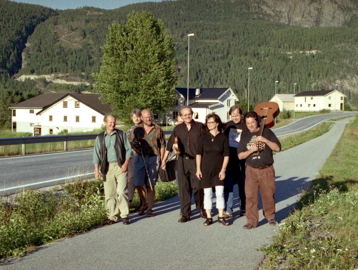 Musicians in Setesdal. Left to right: Elias Akselsen, Gunnar Stubseid, Nils Økland, Halvard Bjørgum, Laila Yrvum, Ånon Egeland and Lasse Johansen. The picture was taken during a folk music contest in August 1999.