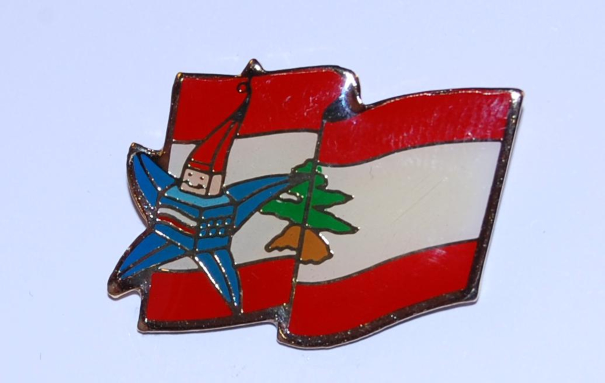 Merke med motiv av det libanesiske flagget og Magique; maskoten for de olympiske vinterleker i Albertville i 1992.