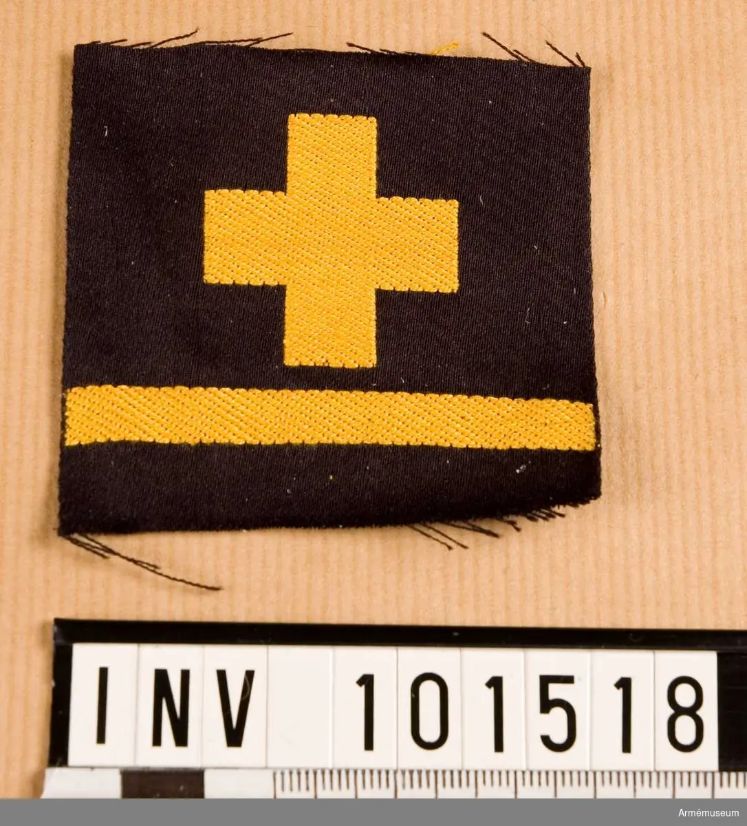 Gradbeteckning: Sjukvårdare, stamanställd, II klassens sjöman, marinen.