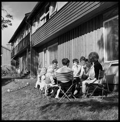 Tilflyttere, kaffekos hjemme.