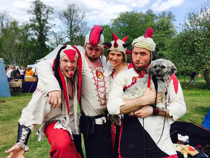 Medieval jesters in jester costumes