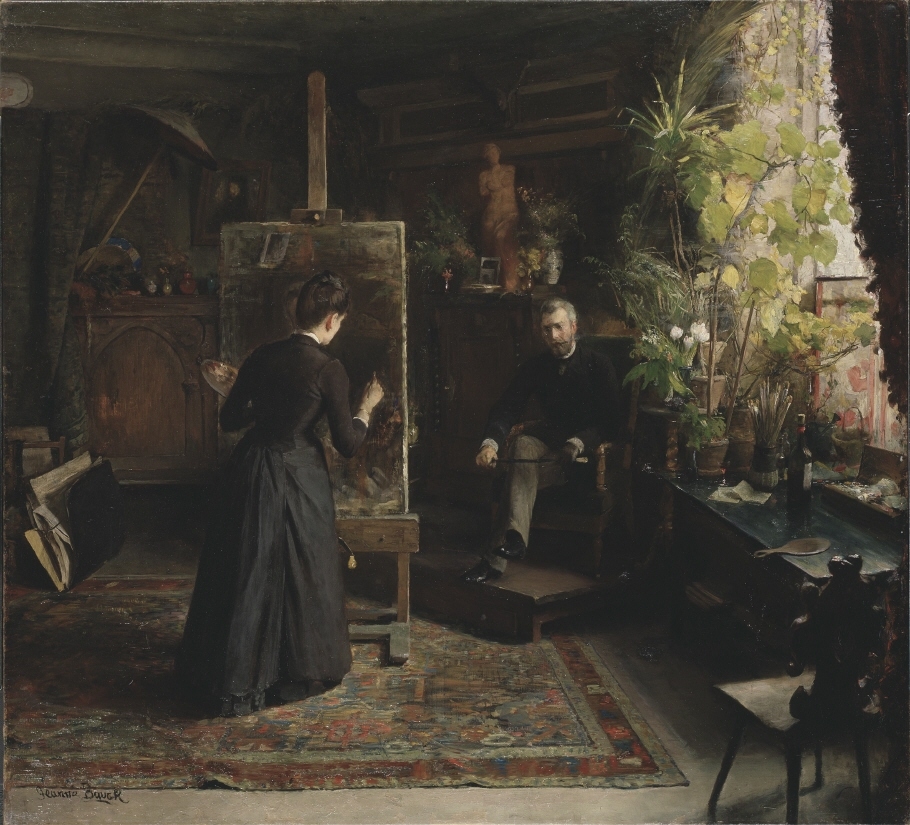 Det är en epokgörande bild, från slutet av 1870-talet, då de yrkesverksamma kvinnorna tog och fick mycket utrymme i det offentliga konstlivet. De lyckades förändra tidens syn på både konstnärsrollen och det borgerliga familjelivet. Jeanna Bauck, som var verksam som porträtt- och landskapsmålare, har här valt att gestalta den kvinnliga konstnären mitt i den skapande processen. Hon skildrar den danska konstnären Bertha Wegmann som helt absorberad av sitt arbete vid staffliet, i deras gemensamma ateljé och hem i München. Motivet1880 reste Jeanna Bauck till Paris, tillsammans med Bertha Wegmann, som hon även där delade ateljé med. Bauck lyckades komma in på Paris-salongen samma år. I en rad banbrytande porträtt av varandra lyckades Bauck och Wegmann bidra till att förändra synen på den kvinnliga konstnären och bröt därmed med den traditionella manliga konstnärsnormen. På 1800-talet upprättades en gräns mellan det privata och det offentliga livet, mellan manligt/kvinnligt, produktion/konsumtion och heroism/hushållsarbete. Det privata rummet – hemmet - framställs som något tidlöst, kvinnosfären blir en till synes statisk scen i förhållande till berättelsen om det moderna livet som försiggår i det offentliga rummet. Man låste bilden av kvinnan som oföränderlig – som natur. Hon har sedan dess inte haft någon given plats i historieskrivningen utan har ansetts stå utanför tidens förändringar. Vid den här tiden kunde borgerliga kvinnor inte röra sig fritt på gatorna i städerna. I de nordiska kvinnliga konstnärernas målningar kan man därför se att de bokstavligen inte tog sig ut ur ateljén: den var både deras hem och arbetsplats. I deras porträtt är ateljén samtidigt de oändliga möjligheternas rum, men också dess absoluta gräns. Den värld som fanns utanför, den moderna staden, valde de att inte måla till skillnad från avantgardets kvinnliga konstnärer som tvingades gestalta moderniteten från husbalkonger och teaterloger.Efter några år i Paris återvände Jeanna Bauck till München där hon grundade en målarskola för kvinnliga konstnärer.