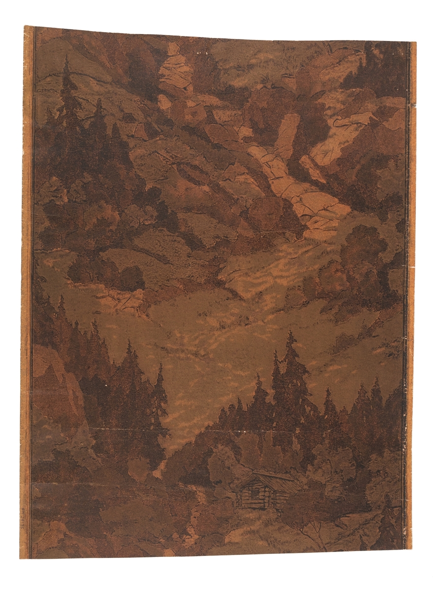 Tapet med skogslandskap och lada, tryckt i olika bruna nyanser samt bronsfärg. IB







