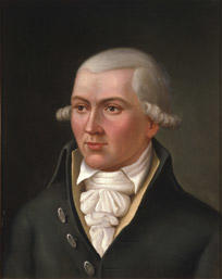 Portrett av Hans C U Midelfart. Grått hår (parykk), mørk kjol (jakke), gul vest, hvit skjorte og halstørkle.. Foto/Photo
