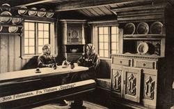 Postkort. Ylistuens "Uppstugu", to kvinner ved langbordet. T